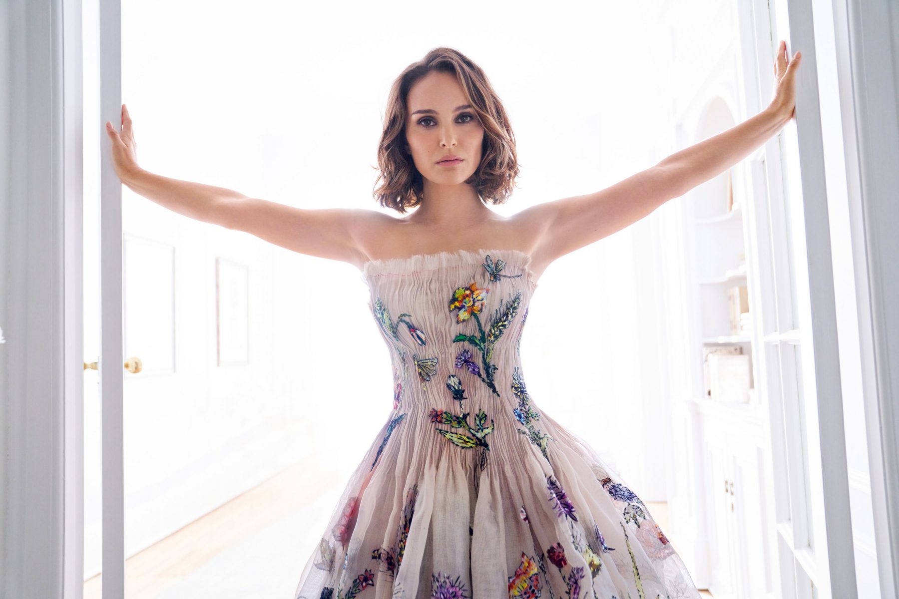 Natalie Portman wears a haute couture dress designed by sir Christian Dior himself